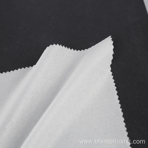 Dry cleanable twill weave woven lining and interlining